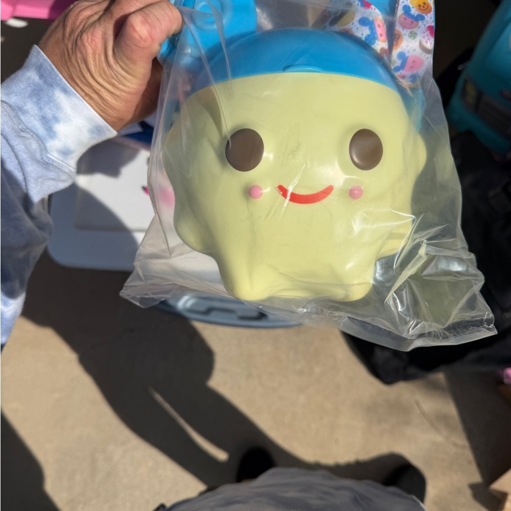 Disney Cream Face Squishy with Blue Top and Pink Cheeks